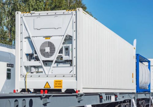 Refrigerated container 20-foot-long on the railway platform.