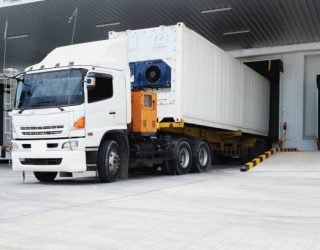 Refrigerator Truck Freezing Food. Transporting goods in the loading goods of the freezing warehouse. Storage for Ready-made foods or Ready-to-Eat Foods. Export-Import Logistics system concept.